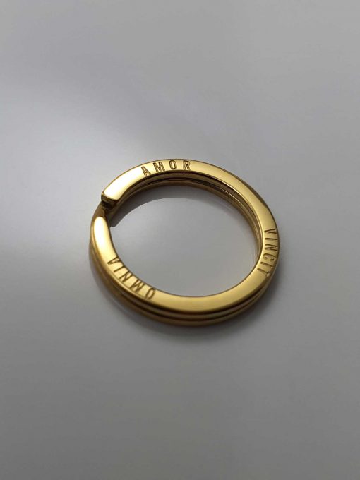 design nyckelring i guld